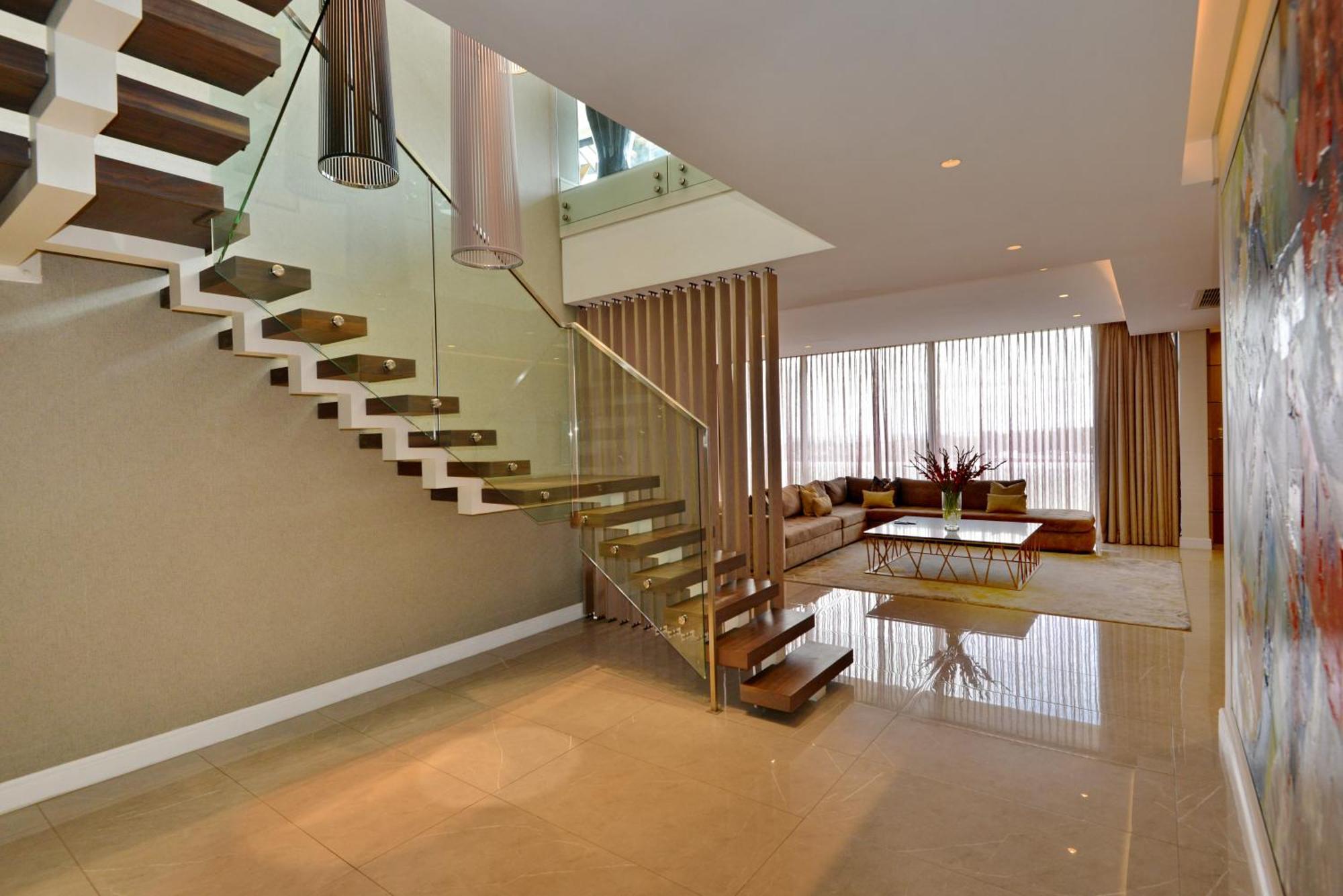 The Houghton Hotel, Spa, Wellness & Golf Johannesburg Bilik gambar A staircase in a house