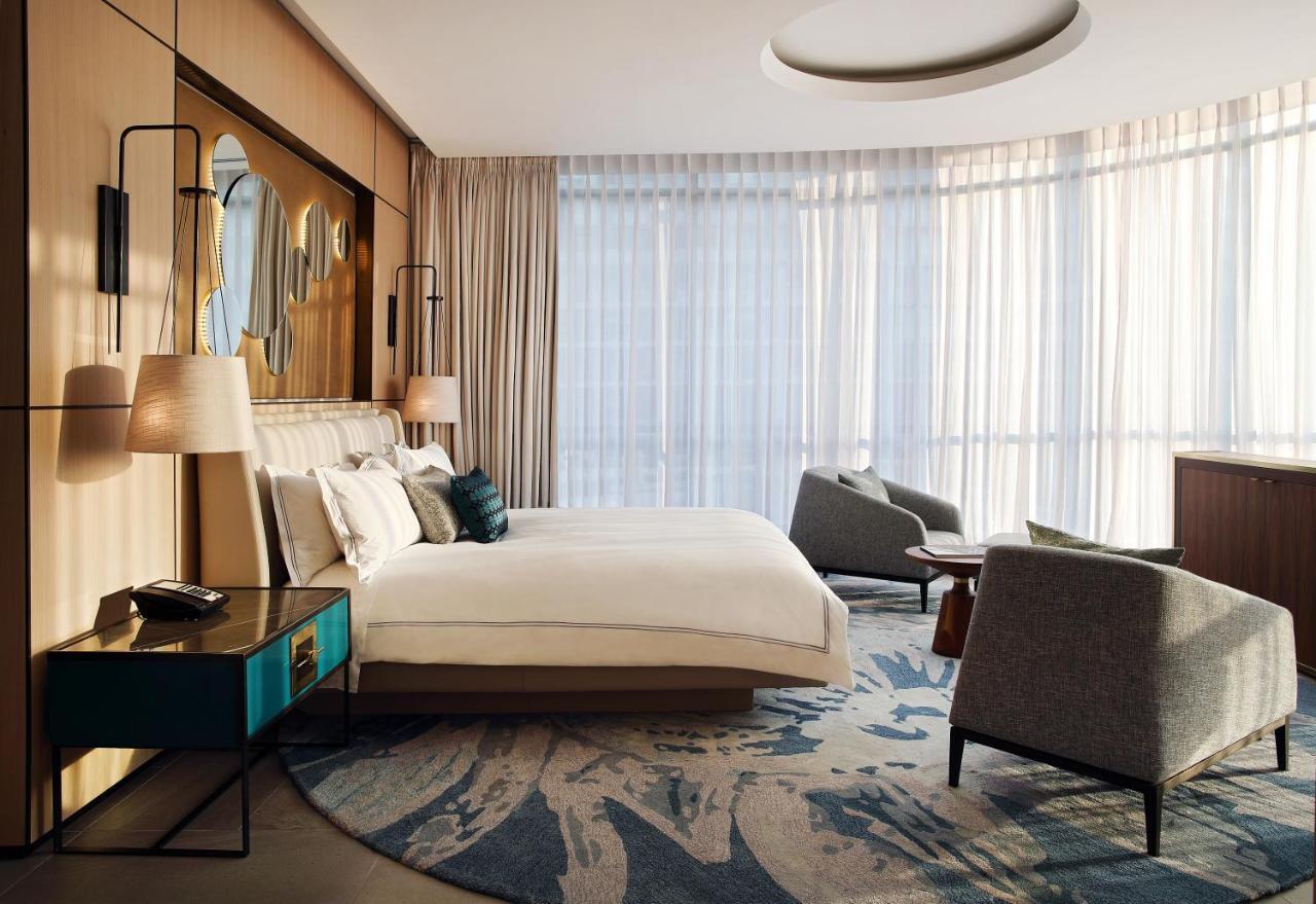 The Houghton Hotel, Spa, Wellness & Golf Johannesburg Luaran gambar A bedroom at the hotel